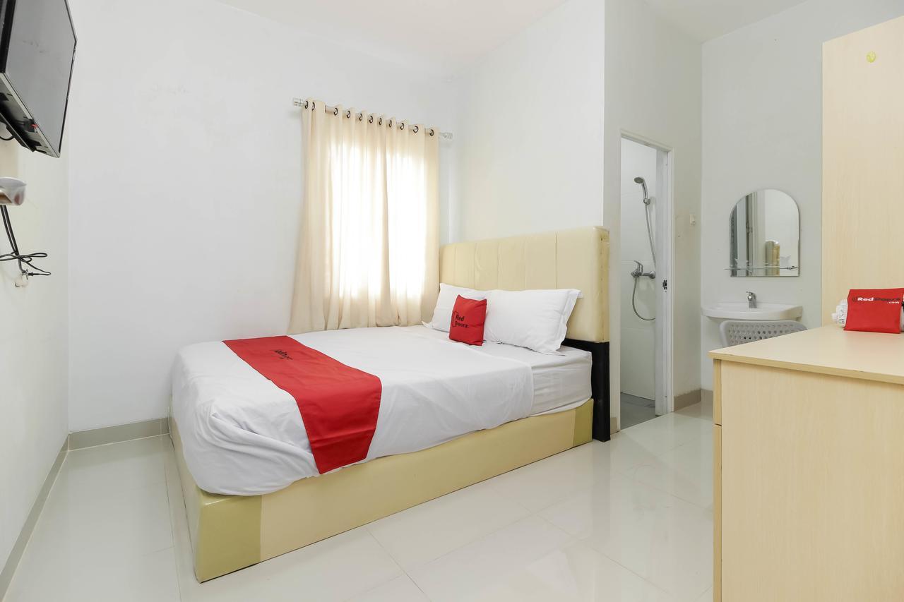 Reddoorz Near Siloam Hospital Palembang Hotel Bagian luar foto